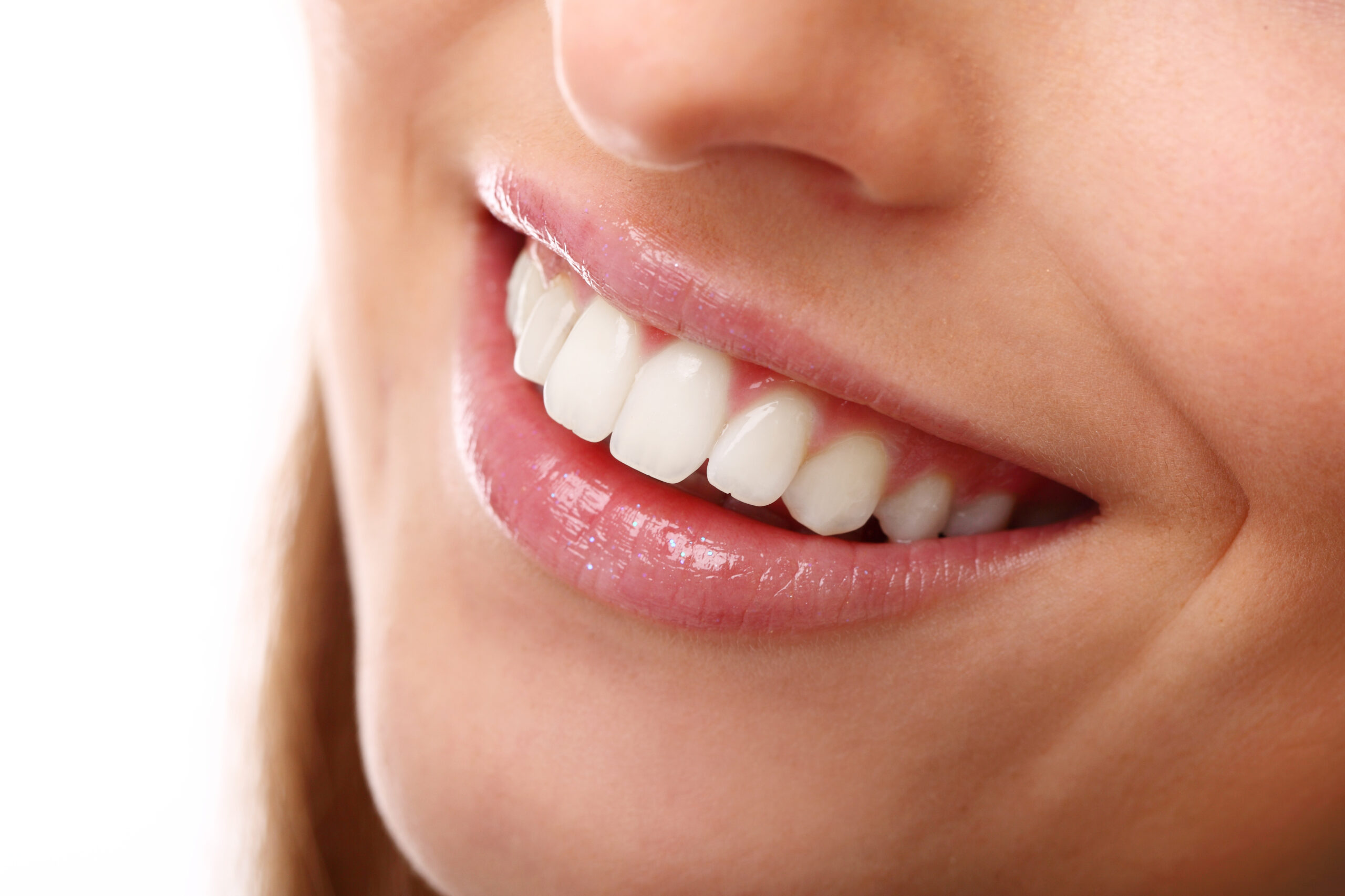 Close up of a woman smiling with white teeth